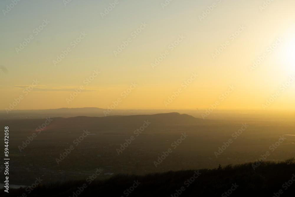 Aerial view of suburban neighborhood, Residential district with buildings and streets at small Canadian town at sunset. Hiking paysage. Selective focus landscape. 