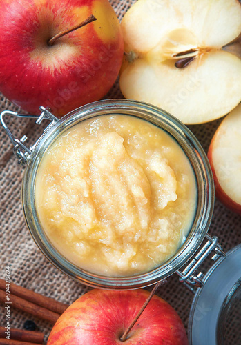 фотографія Fresh homemade applesauce with apples. Top view