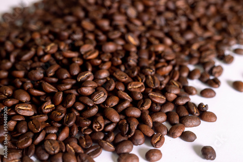 Roasted coffee beans background colombian coffe rought coffee