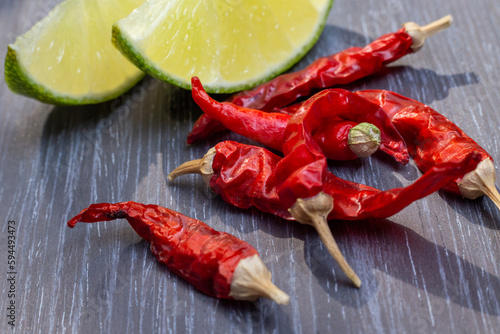 red hot chili pepper , spicy jalapeno , dry chili and lemon