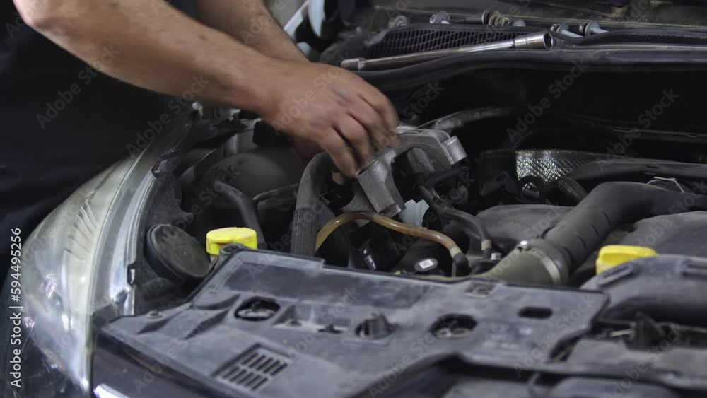 Maintenance and Repair of Old Car Engine in the Repair Shop Footage. Maintenance and Repair of Old Car Engine in the Repair Shop Footage.