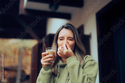 Woman Not Standing the Smell of the Caffeine Beverage. Person with hypersensitivity to odors feeling disgusted by coffee aroma
 photo