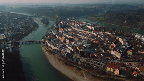 Wasserburg am Inn, medieval old town in Bavaria, Germany, surrounded by epic river bend. Aerial drone footage of European houses, castle, bridge, church and market square in early morning fog. 4K UHD photo