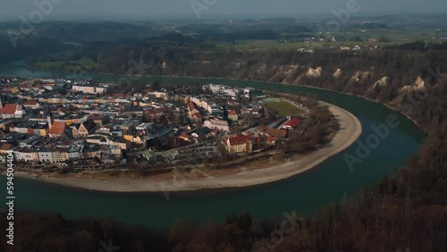 Wasserburg am Inn, old medieval town in Bavaria, Germany surrounded by scenic river bend. Aerial drone footage of European houses, castle, bridge, church and market square in early morning fog. 4K UHD photo