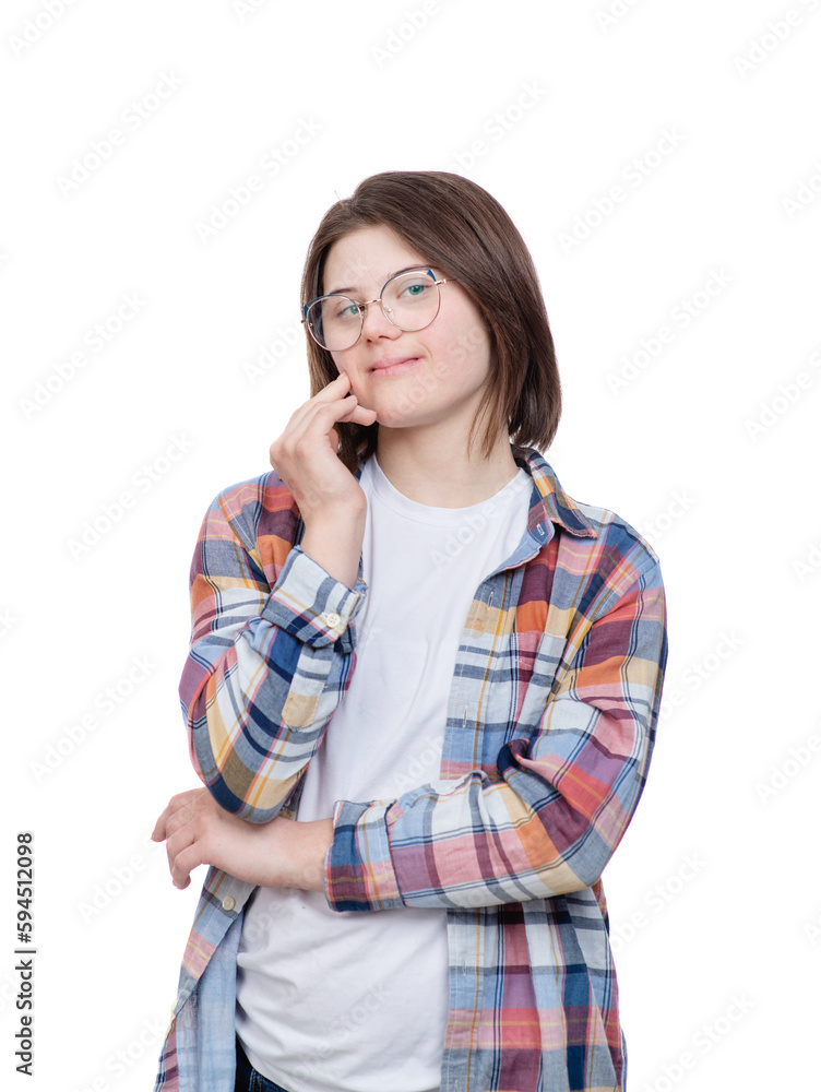 Pensive teen girl with Downs syndrom looks away on empty space. Isolated on white background Pensive teen girl with Downs syndrom looks away on empty space. Isolated on white background