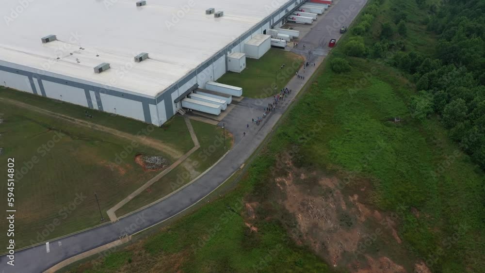 People walking on an asphalt road. Aerial shot above them. Run for the Oceans Event People walking on an asphalt road. Aerial shot above them. Run for the Oceans Event