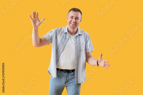 Mature man opening arms for...