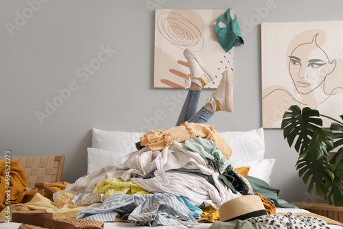 Woman with stack of dirty c...