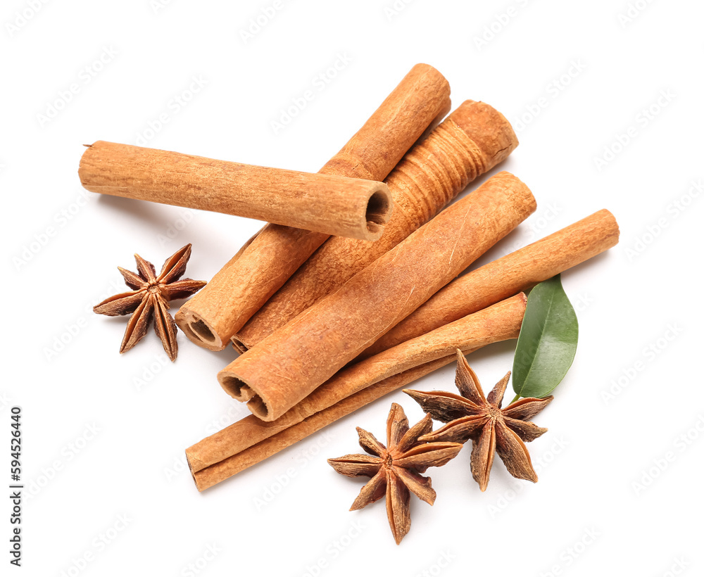 Cinnamon sticks with anise and leaf on white background Cinnamon sticks with anise and leaf on white background