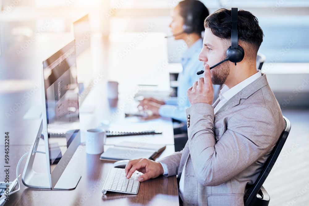 Call center, computer and consulting with man in office for customer service, technical support or help desk. Telemarketing, contact us and communication with employee for legal advice and talking Call center, computer and consulting with man in office for customer service, technical support or help desk. Telemarketing, contact us and communication with employee for legal advice and talking