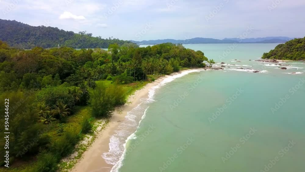 drone shot of white sand beach on tropical island in langkawi Malaysia drone shot of white sand beach on tropical island in langkawi Malaysia