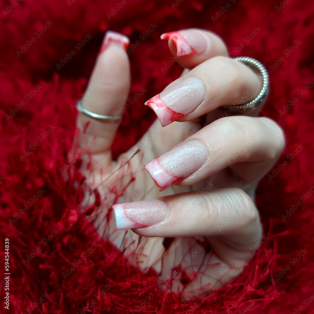 Premium Photo | Bright festive red manicure on female hands nails design