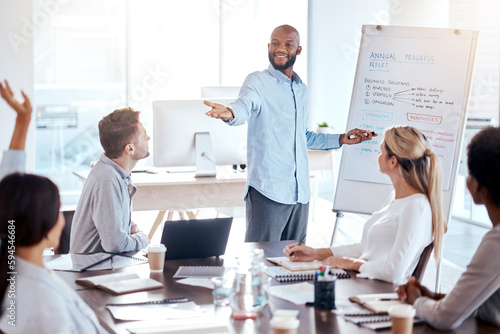 Presentation, question and whiteboard with a business man in the office and talking to team about our vision. Meeting, teaching and information with an african american male speaker giving a workshop