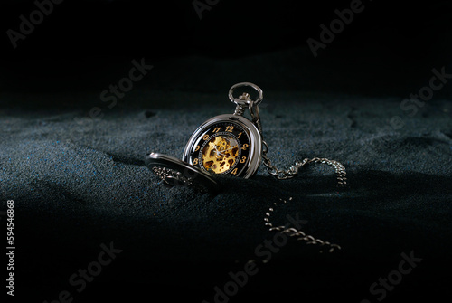 pocket watch on dark background