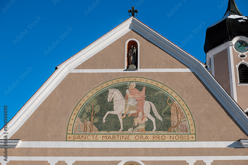 Kirchenfrontgemälde: Der hl. Martin teilt den Mantel. Benediktinerkloster, Beuron, Deutschland - obrazy, fototapety, plakaty 