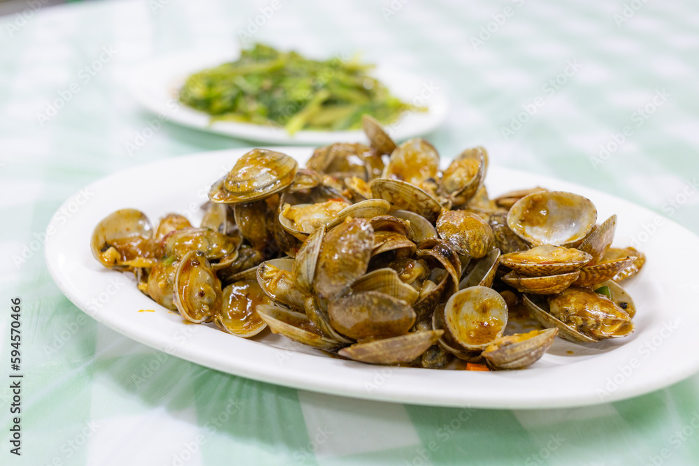 Chinese dishes stir fry clam with the sauce Chinese dishes stir fry clam with the sauce