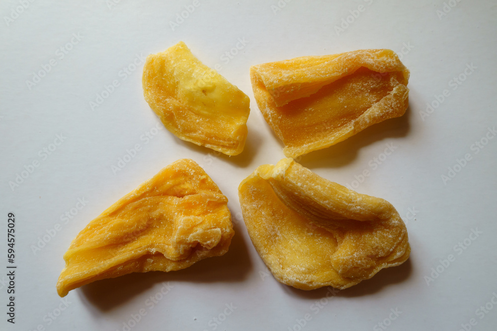 Four pieces of fleshy yellow dried jack fruit from above Four pieces of fleshy yellow dried jack fruit from above