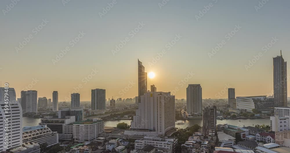 Day to night time lapse movie over the illuminated skyline of Bangkok from aerial position Day to night time lapse movie over the illuminated skyline of Bangkok from aerial position