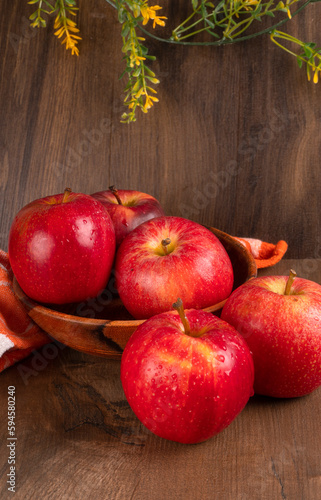 Red apple fruit isolated on wooden background