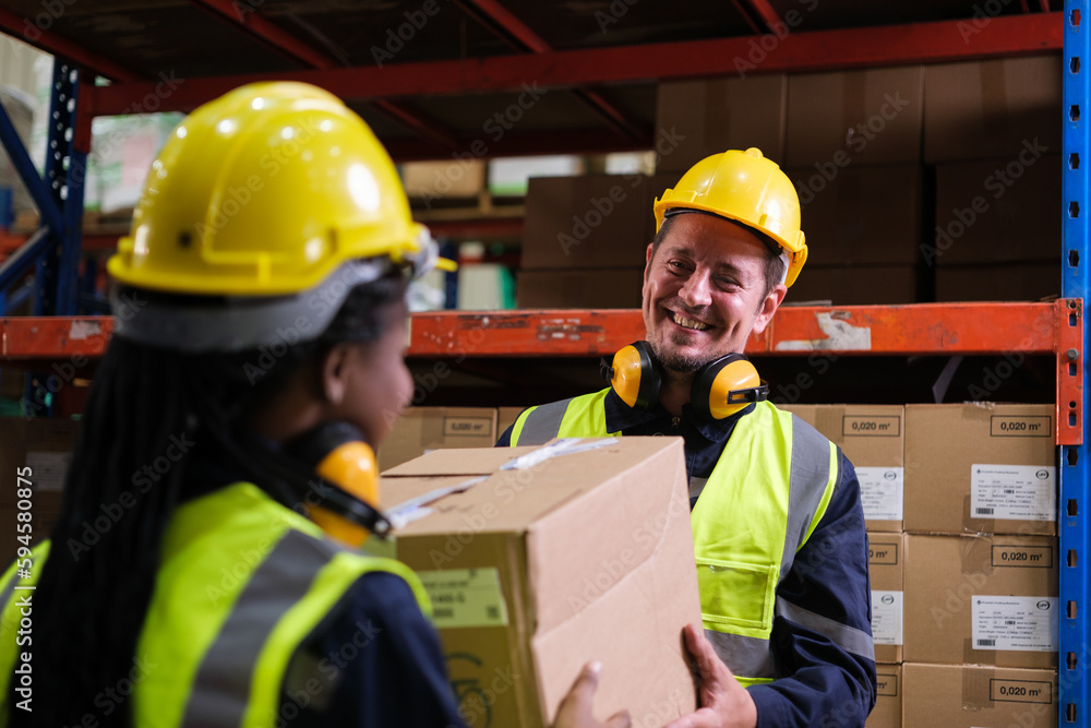 Group of Industrial workers working at warehouse factory. Group of Industrial workers working at warehouse factory.