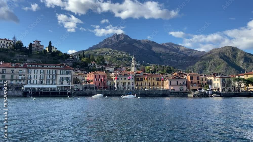 View from boat of picturesque and beautiful village of Varenna Italian village in Lago di Como