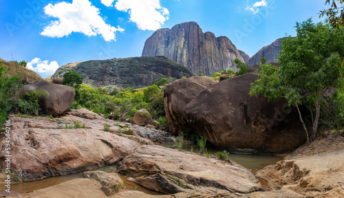 Andringitra national park, Haute Matsiatra region, Madagascar, beautiful mountain landscape with river in valley. Hiking in Andringitra mountains. Sunny day. Madagascar wilderness mountain landscape.