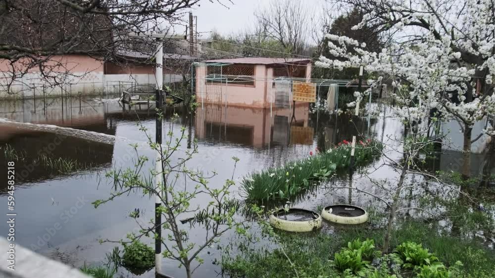 Flooding Of Private Houses, Flood In The Village. Flooded Roads, Trees 