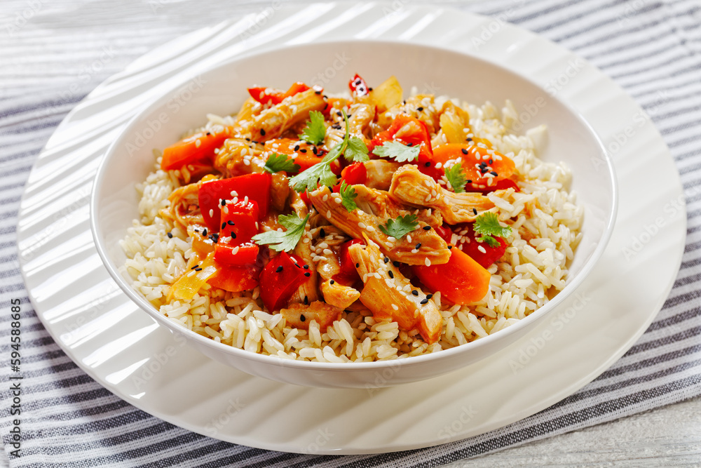 sweet and sour chicken with veggies and rice