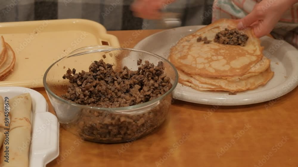woman preparing breakfast dinner lunch pancakes with meat visible food human hands woman preparing breakfast dinner lunch pancakes with meat visible food human hands