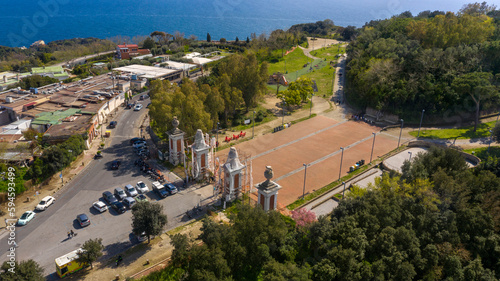 Aerial view of the entrance of Virgiliano park, also called Park of Remembrance, a scenic park located on the hill of Posillipo, Naples, Italy. From the promontory there's a view of the Gulf of Naples