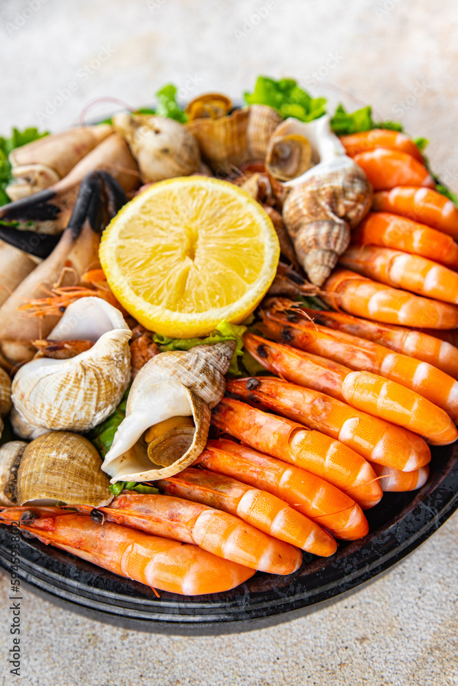 seafood platter Fruits de mer shrimp, crab claw, clam, rapan, trumpeter