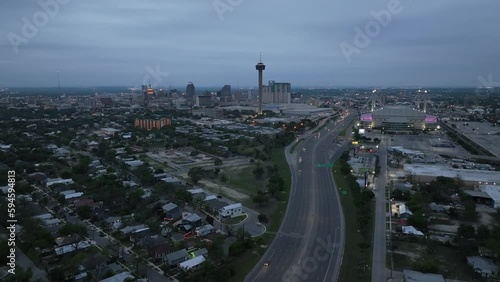 San Antonio, Texas wide shot skyline in the evening with drone video moving left to right. photo