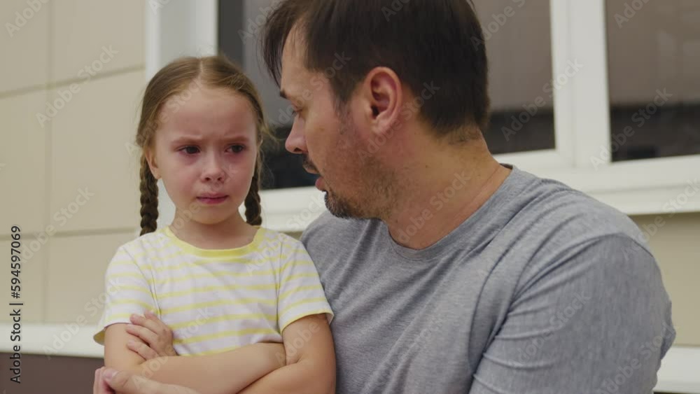 little girl makes scandal her dad. Upset Child throws temper tantrum