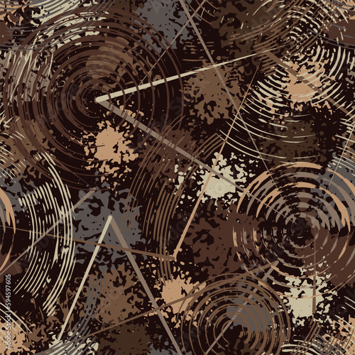 Abstract brown camouflage pattern with splattered paint, paint brush strokes, circles, concentric circular shapes like target. For apparel, fabric, textile, sport goods Grunge texture