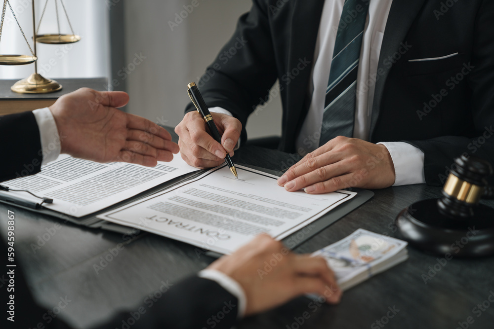 business woman offers bribes to lawyers To help with legal matters in court, bribes corruption illegal fraud bribery concept. business woman offers bribes to lawyers To help with legal matters in court, bribes corruption illegal fraud bribery concept.