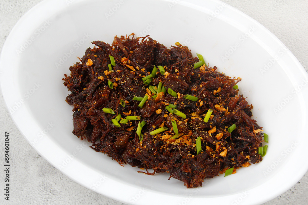 Freshly cooked shredded beef tapa or shredded cured beef Freshly cooked shredded beef tapa or shredded cured beef