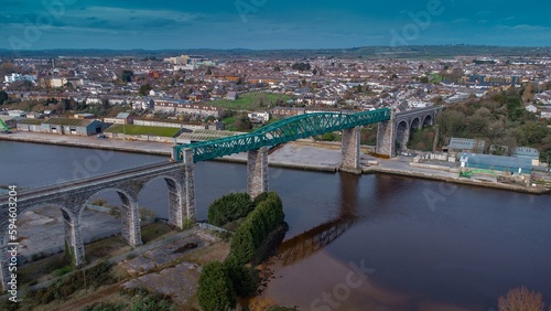 Obraz na płótnie Amazing Boyne viaduct in drogheda spanning over river Boyne in early evening hours. Beautiful pucture of a green metal viaduct and stone arches. w salonie