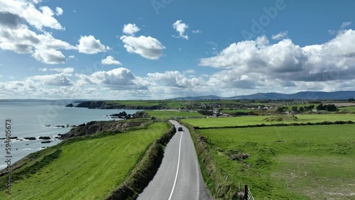 Ireland Coast Waterford car driving on the Copper Coast road at Tankardstown photo