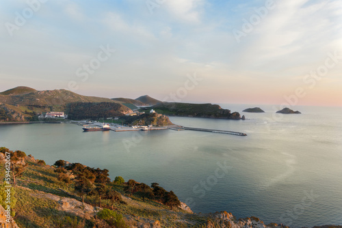 The port of Myrina on the island of Limnos, with the church of Agios Nikolaos and the Aegean Sea in the background