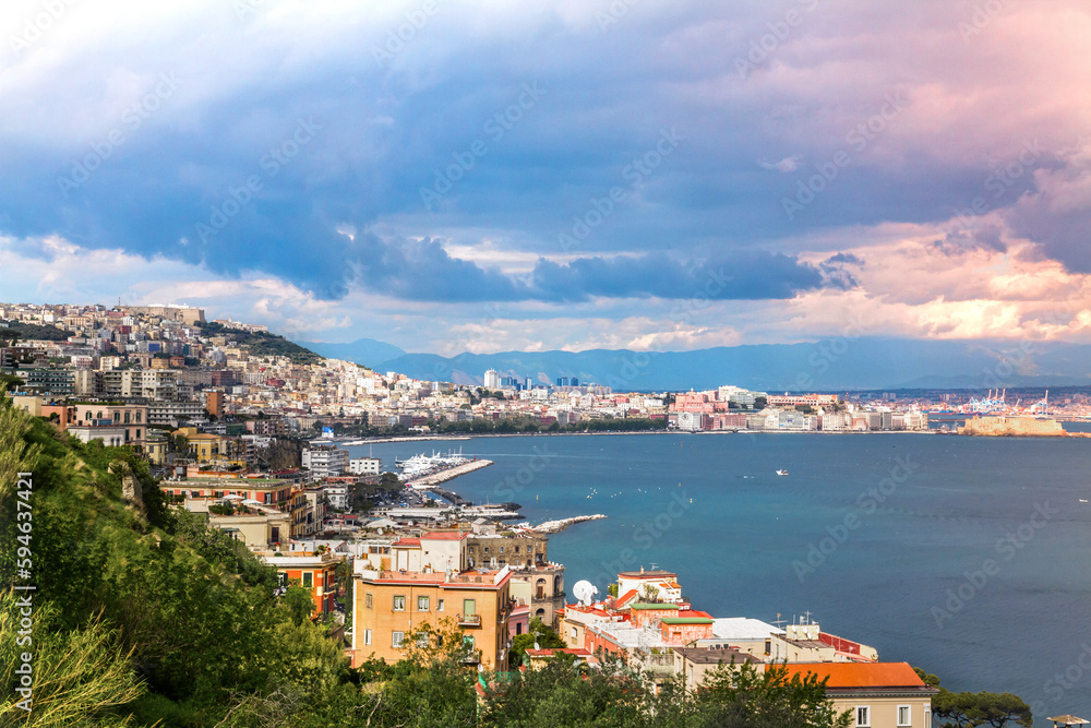 The picturesque coast of Naples. Blue sea with cloudy sky