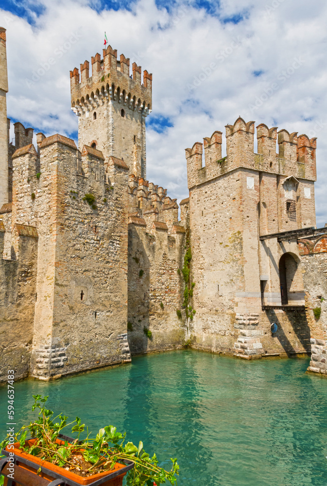 Towers of the medieval castle Sermione. View from the lake Garda