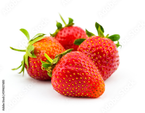 Close-up view of fresh strawberries isolated on white background