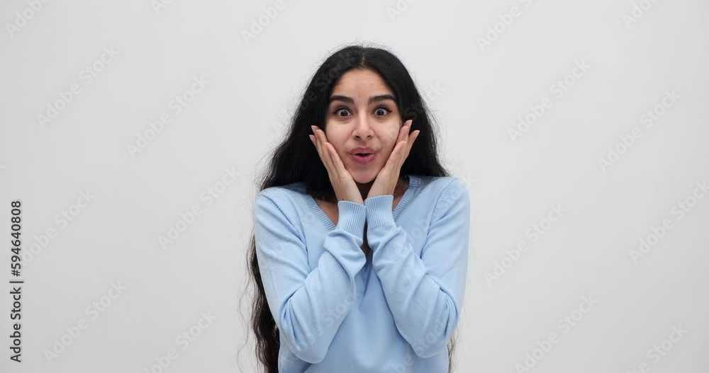 Astonished young woman receiving unexpected good news Astonished young woman receiving unexpected good news