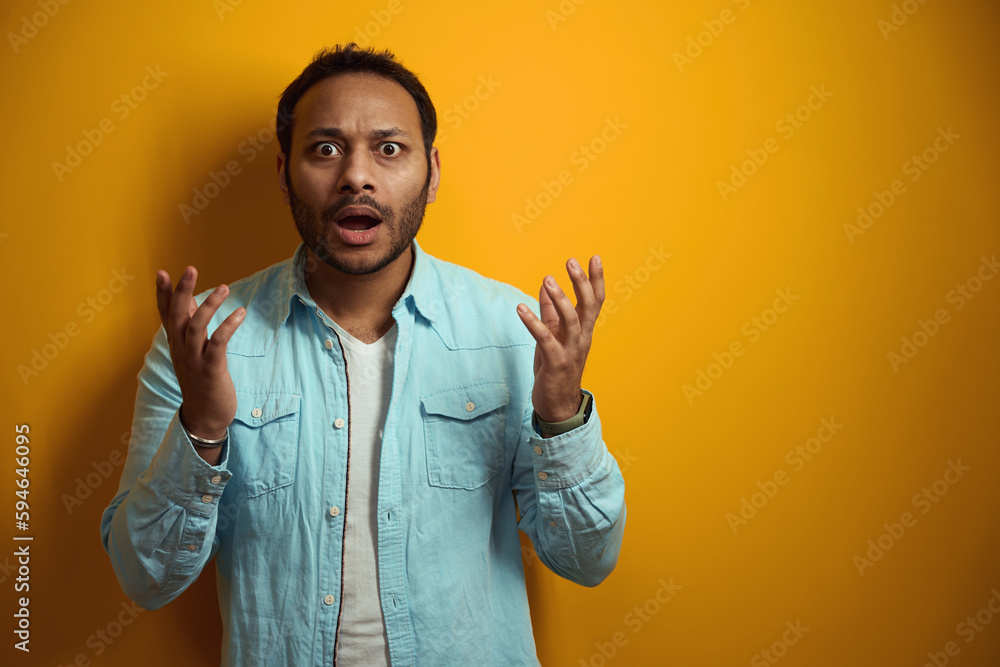Portrait of Hindu surprised man ready to work Portrait of Hindu surprised man ready to work