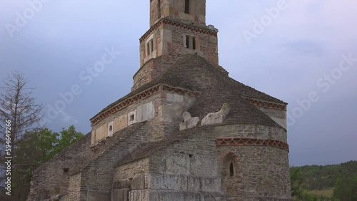 Tilt view of the ancient Densus stone church in Romania photo