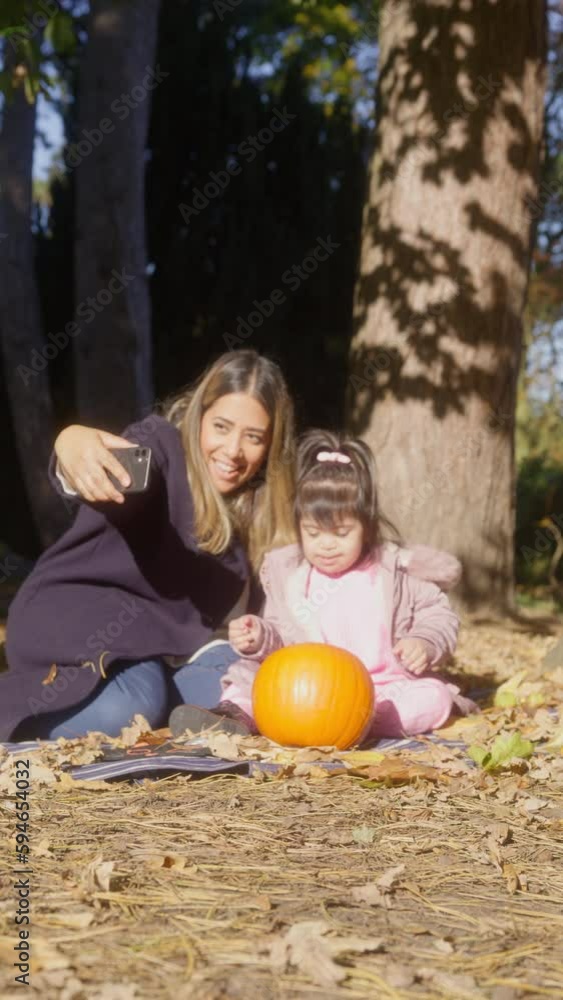 MS SLO MO Mother and daughter (2-3) with Down syndrome taking selfie MS SLO MO Mother and daughter (2-3) with Down syndrome taking selfie