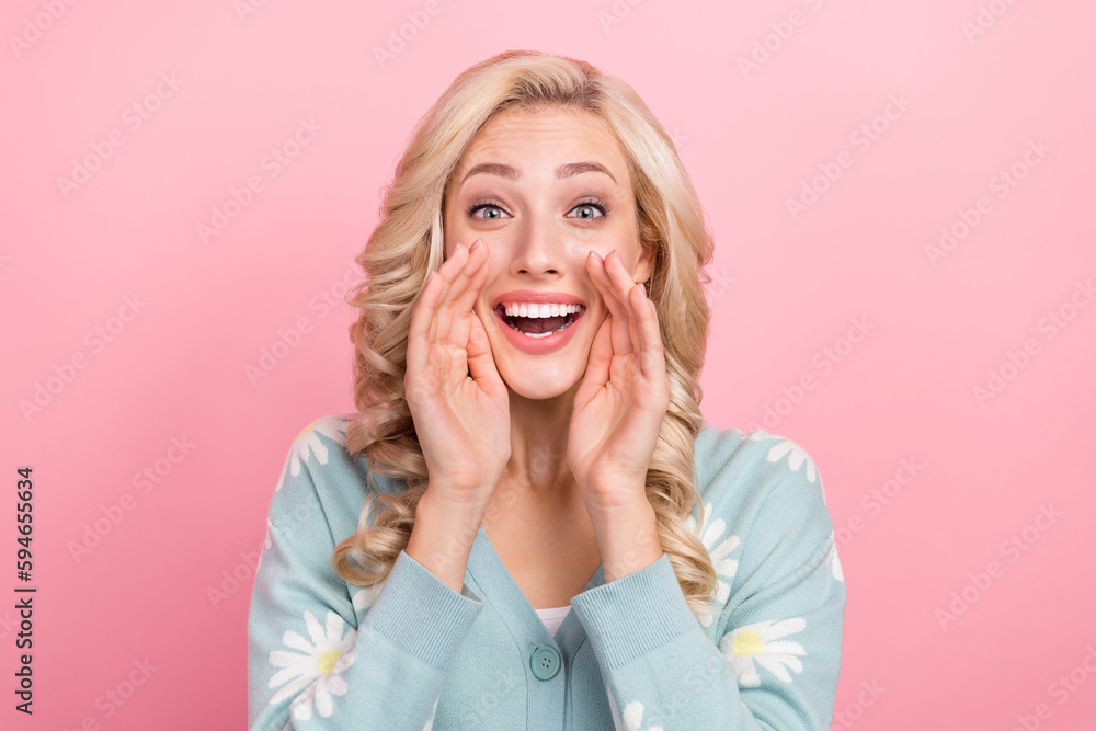 Photo of young excited girl hands cheeks screaming information announce say gossip information message isolated on pink color background Photo of young excited girl hands cheeks screaming information announce say gossip information message isolated on pink color background