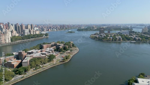 Wallpaper Mural Drone shot of a cityscape and river under cloudless blue sky Torontodigital.ca