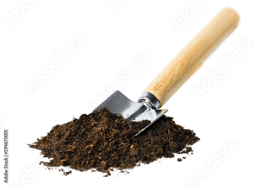 garden shovel and a pile of soil on a white isolated background