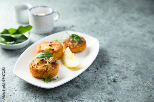 Traditional homemade fish cakes with lemon